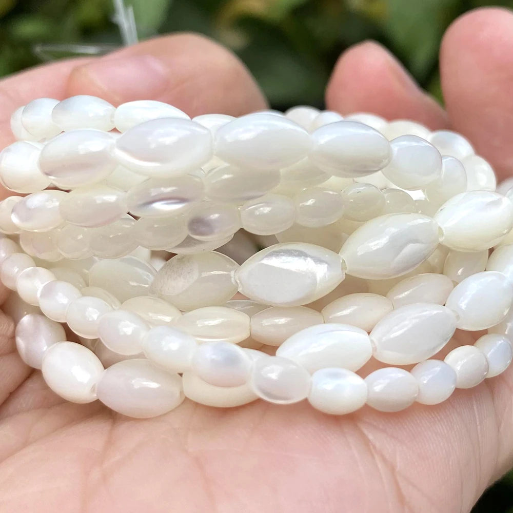 White oval shell beads in various sizes