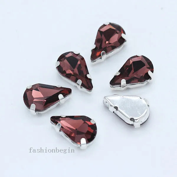 Droppformade strass stenar man syr fast