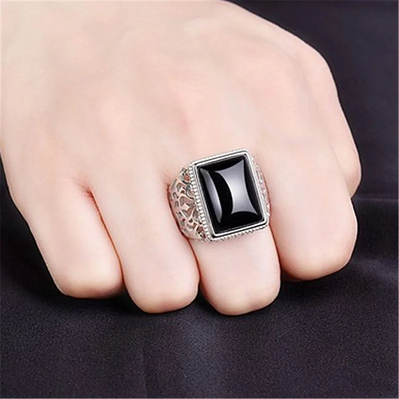 Wide ring in genuine silver with a crystal stone in the middle.