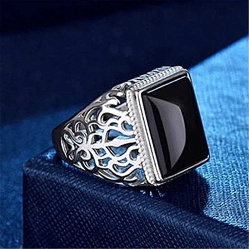 Wide ring in genuine silver with a crystal stone in the middle.