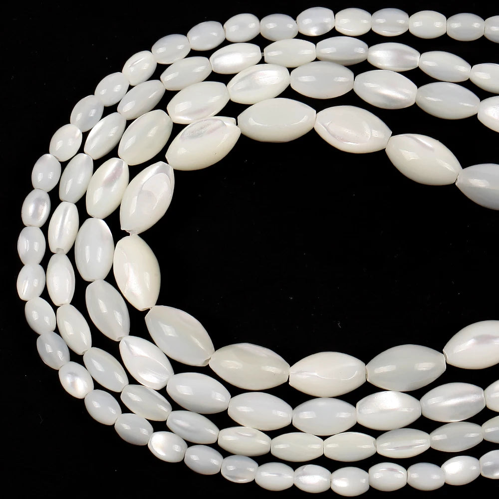 White oval shell beads in various sizes