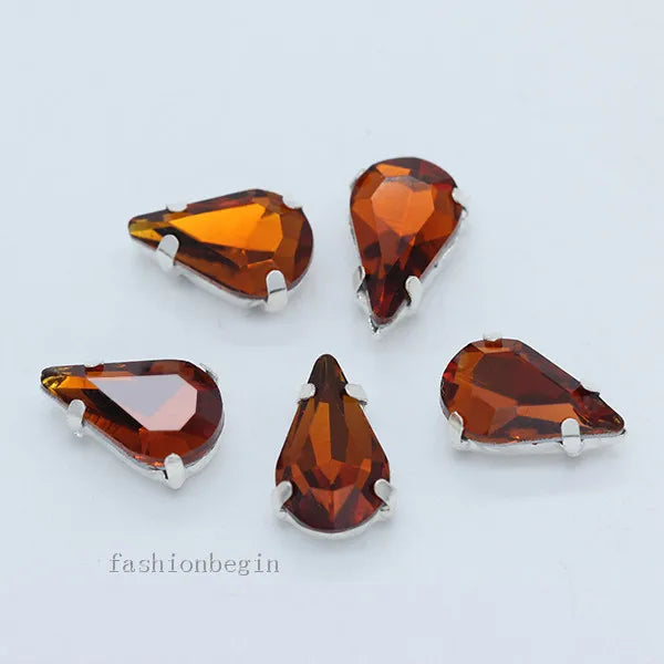 Droppformade strass stenar man syr fast