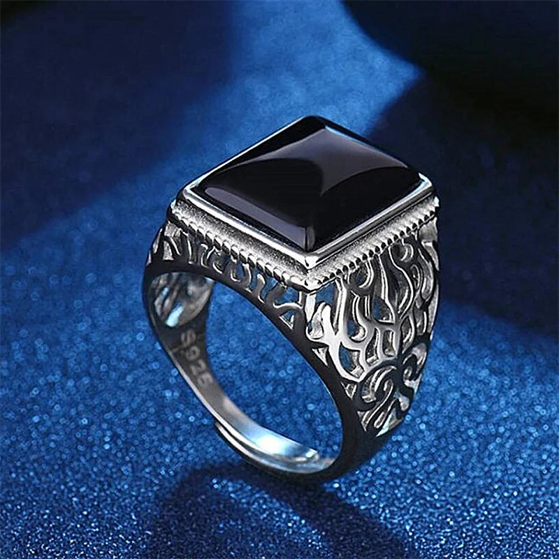 Wide ring in genuine silver with a crystal stone in the middle.