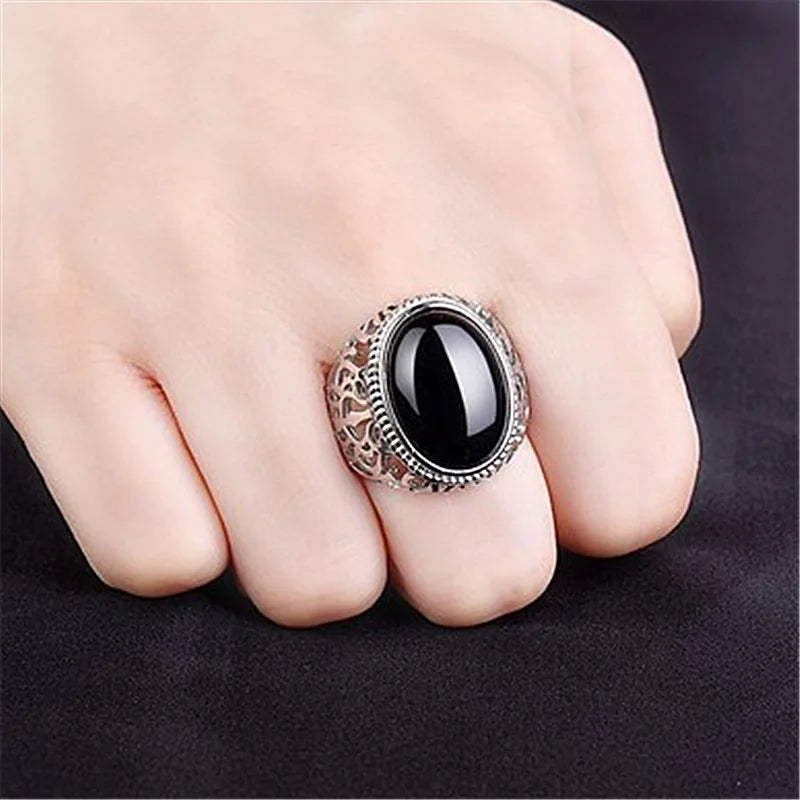 Wide ring in genuine silver with a crystal stone in the middle.