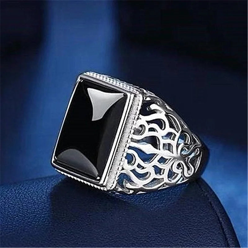 Wide ring in genuine silver with a crystal stone in the middle.