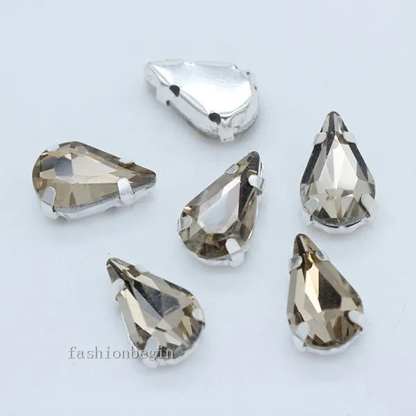 Droppformade strass stenar man syr fast