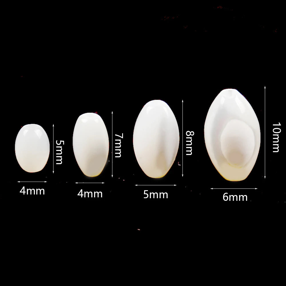 White oval shell beads in various sizes