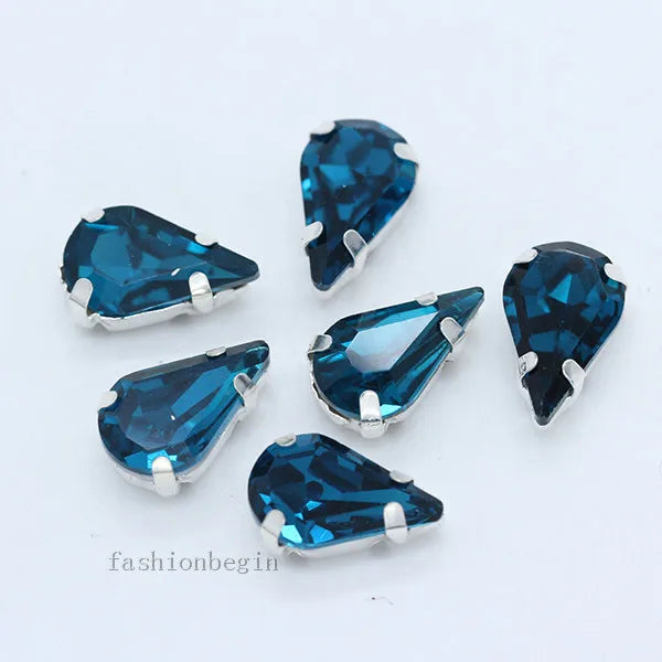 Droppformade strass stenar man syr fast