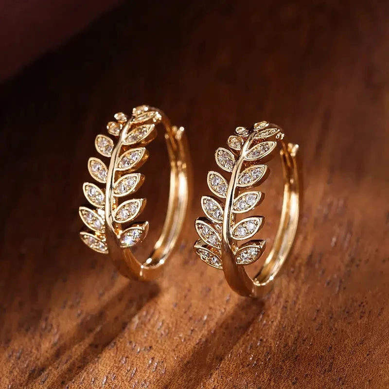 Earrings hoops with leaves in rhinestones