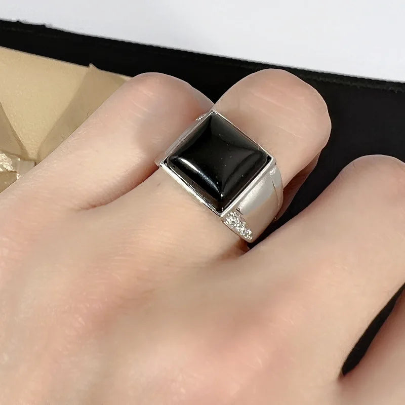 Wide ring in genuine silver with a crystal stone in the middle.
