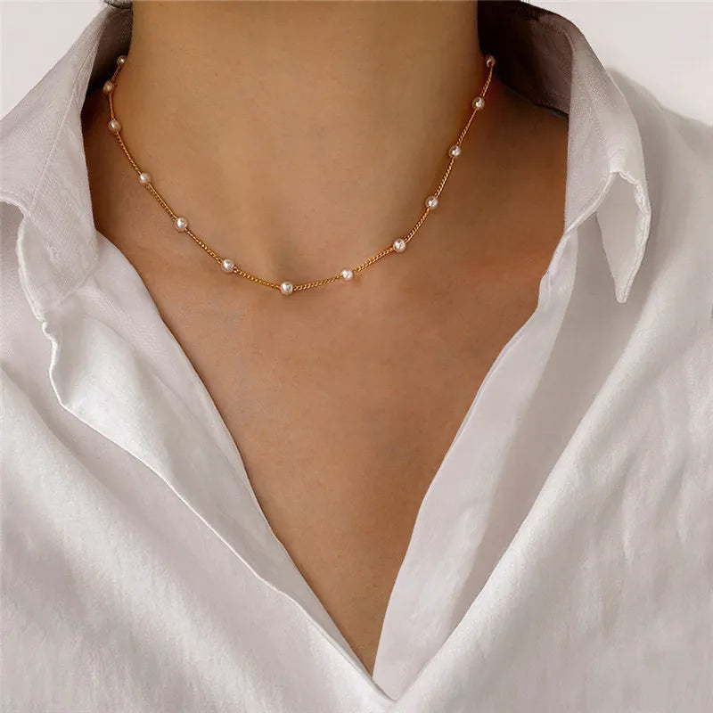 Matchande halsband och örhängen med kedja och pearls