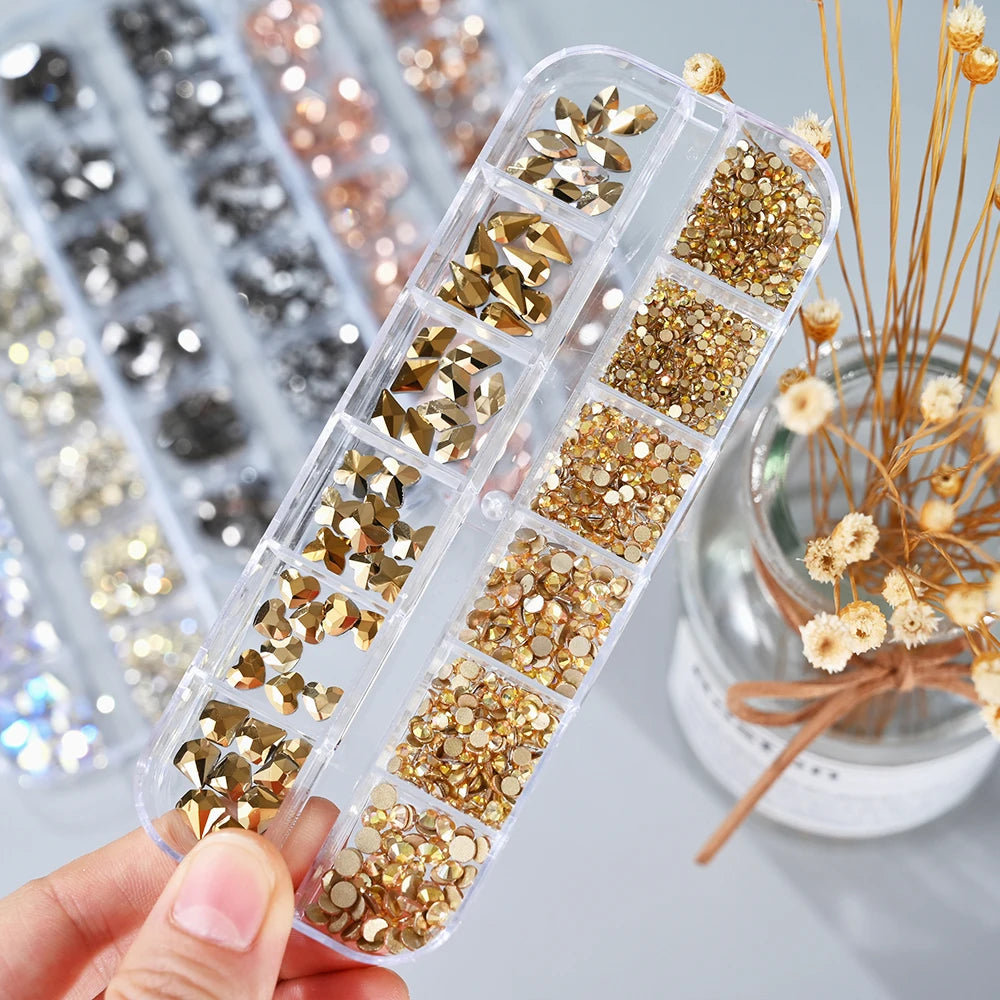 Box with rhinestones of different shapes