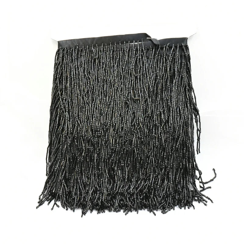 Tassel med glaspärlor