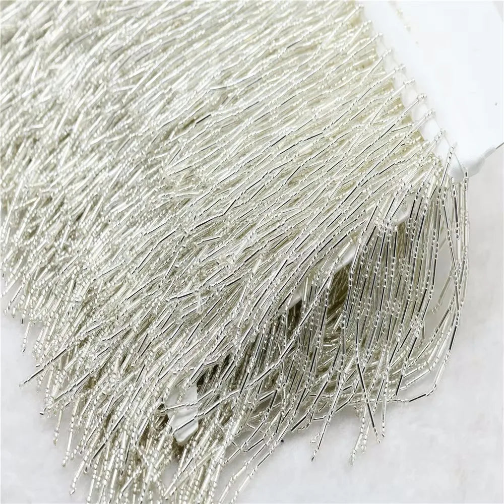 Tassel med glaspärlor