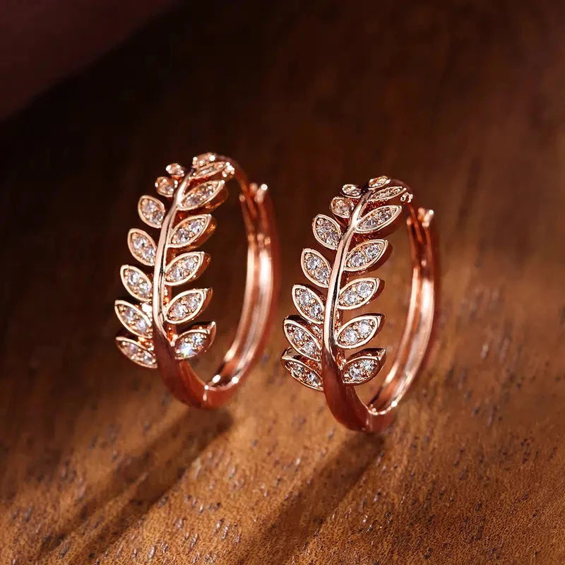 Earrings hoops with leaves in rhinestones