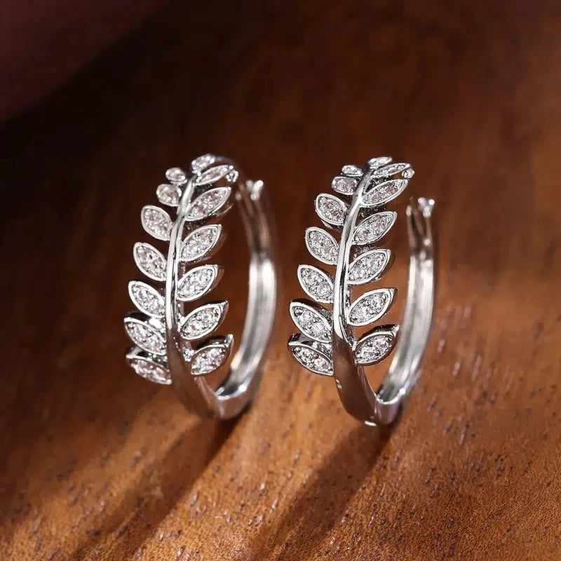 Earrings hoops with leaves in rhinestones