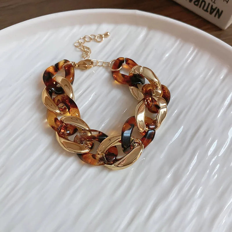 3-set med halsband armband och örhängen brunmönstrad akryl kedja