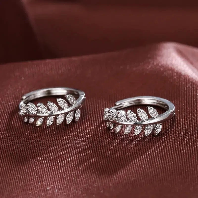 Earrings hoops with leaves in rhinestones