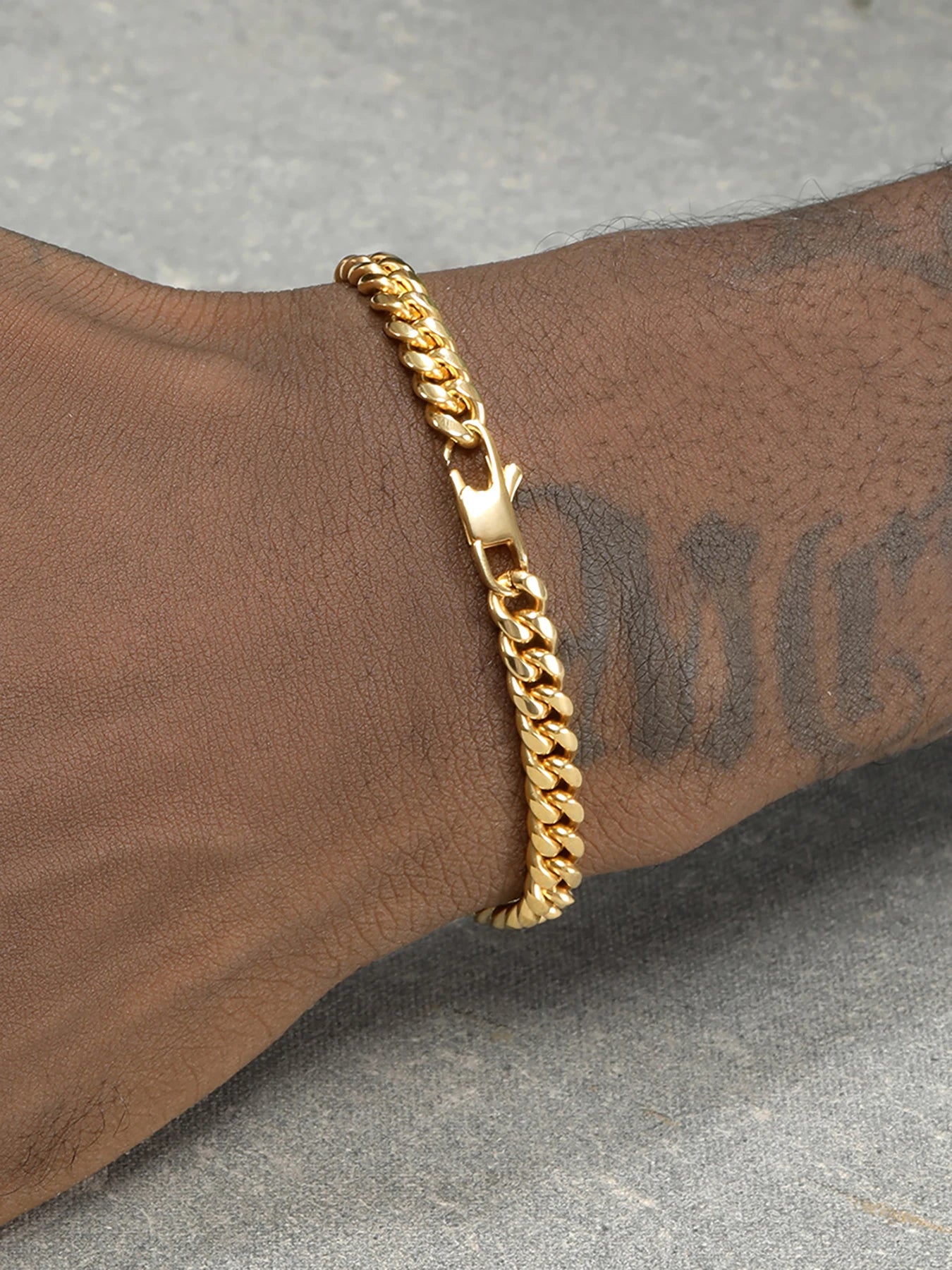 Armband för men med curb kedja 18k guld