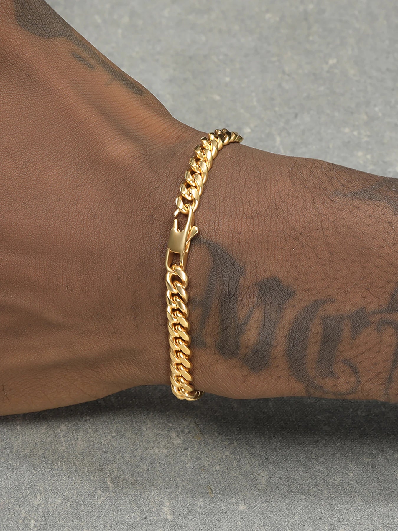 Armband för men med curb kedja 18k guld