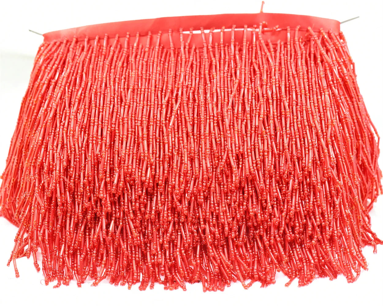 Tassel med glaspärlor