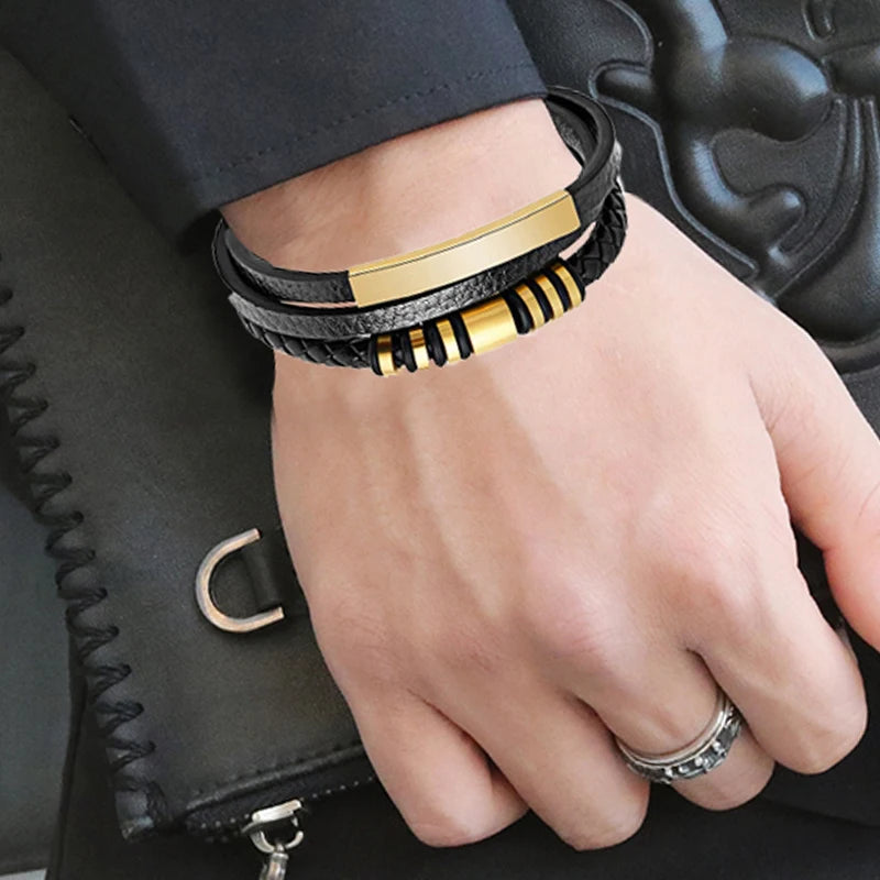 Armband svart läder med guld detaljer