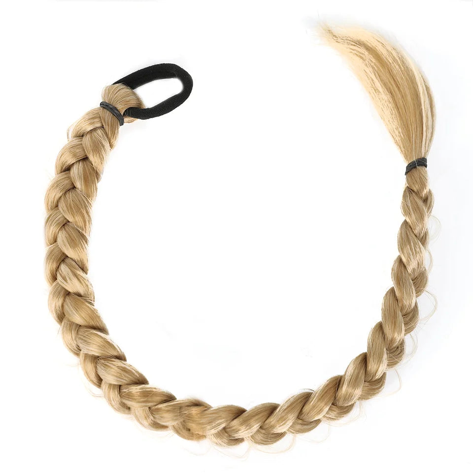 Lös hår med lång flätad hästsvans