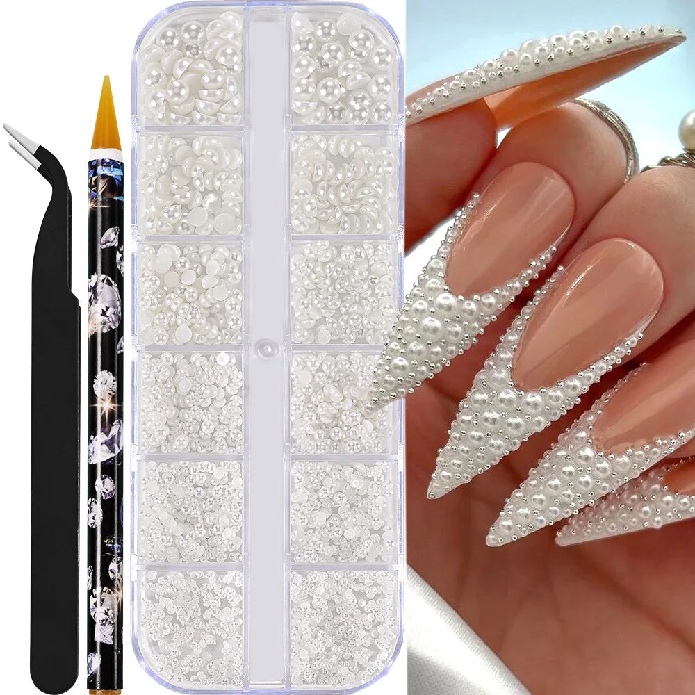 Låda med små pearls eller strass stenar med verktyg