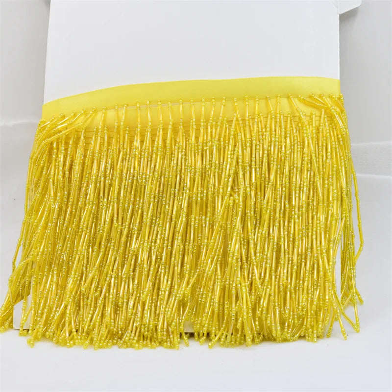 Tassel med glaspärlor