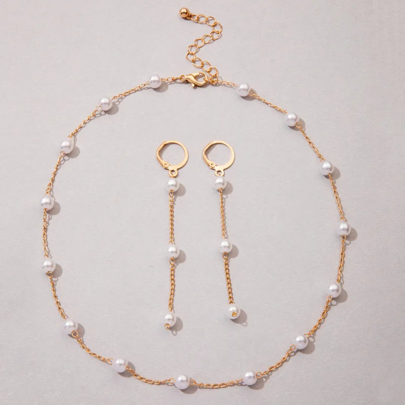 Matchande halsband och örhängen med kedja och pearls