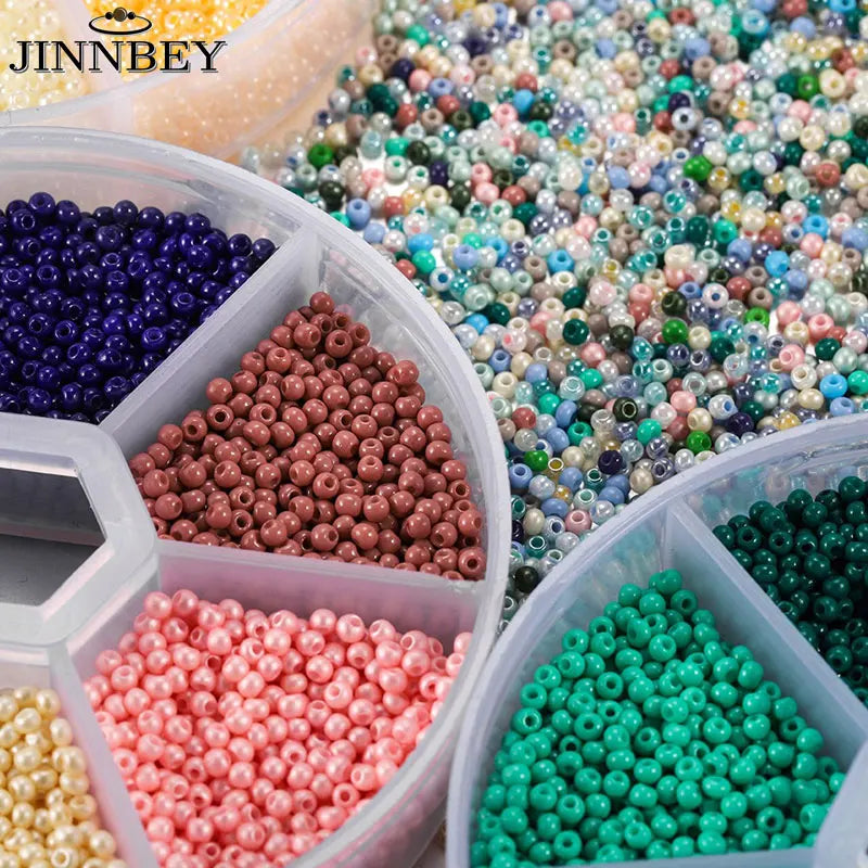 Bead boxes with seed beads in bright colors