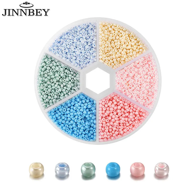 Bead boxes with seed beads in bright colors