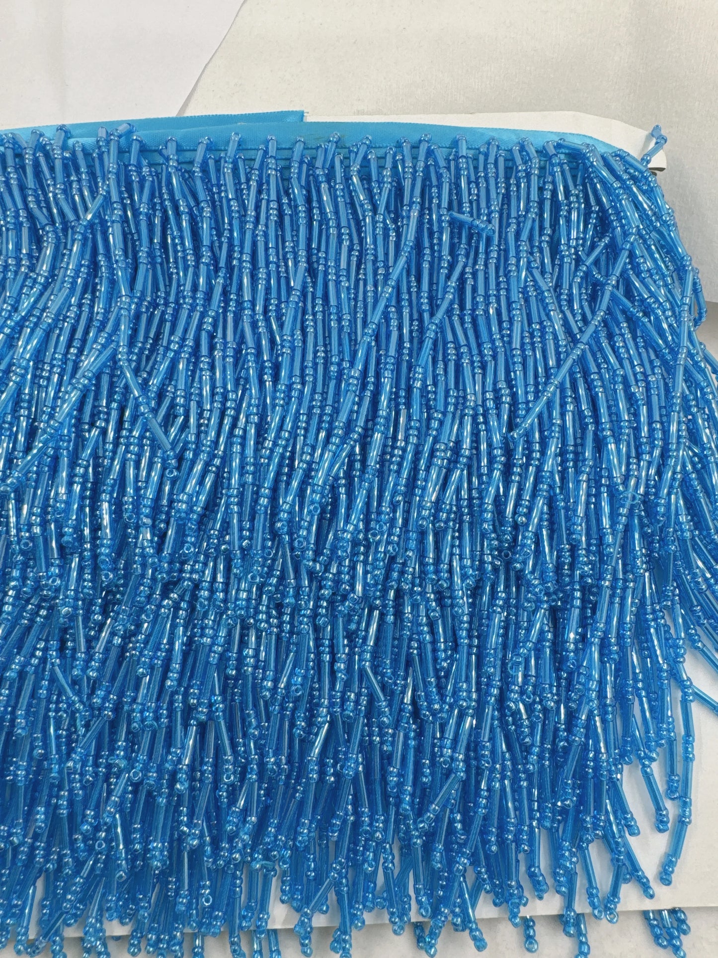 Tassel med glaspärlor