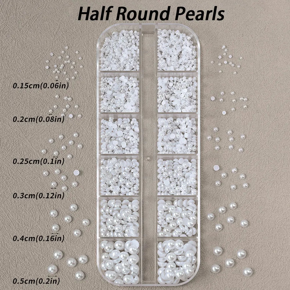 Låda med små pearls eller strass stenar med verktyg