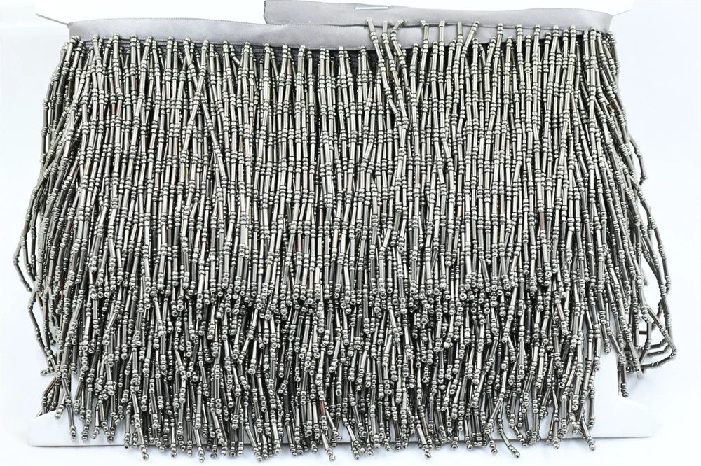 Tassel med glaspärlor