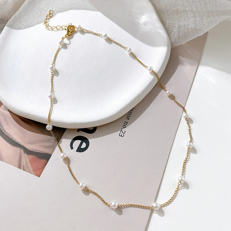 Matchande halsband och örhängen med kedja och pearls