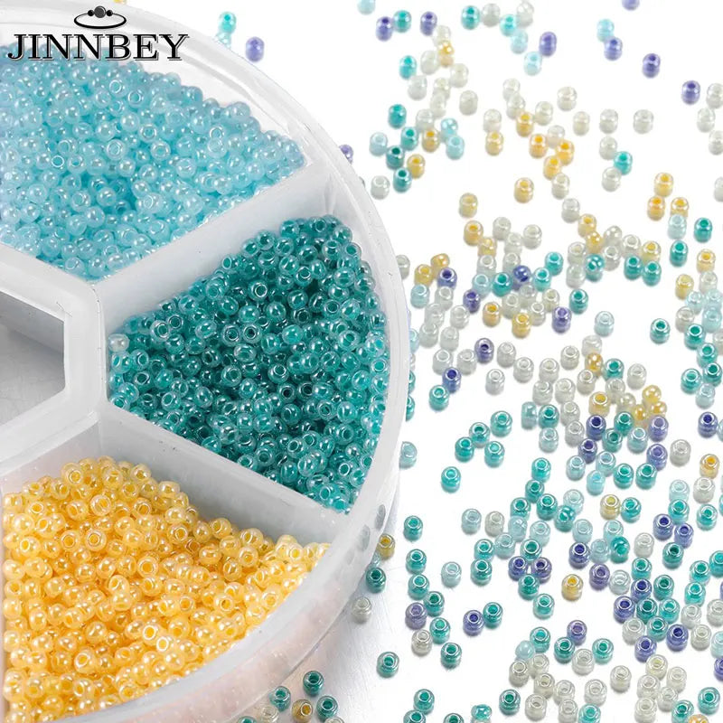 Bead boxes with seed beads in bright colors