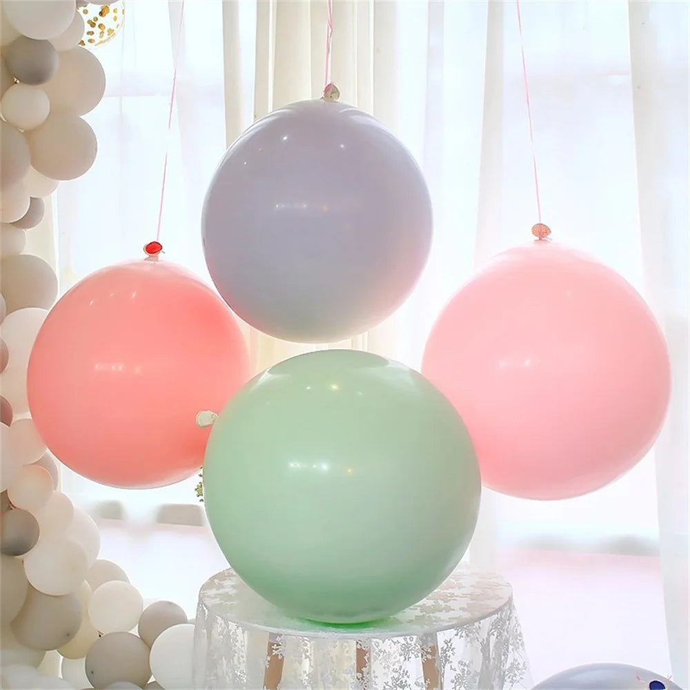 Stora pastellfärgade ballonger