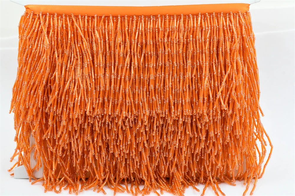 Tassel med glaspärlor