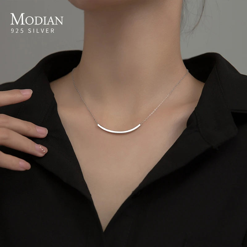 Necklace with tube-shaped link
