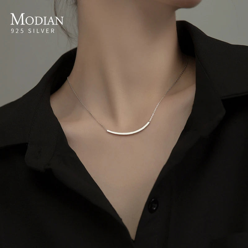 Necklace with tube-shaped link