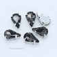 Droppformade strass stenar man syr fast