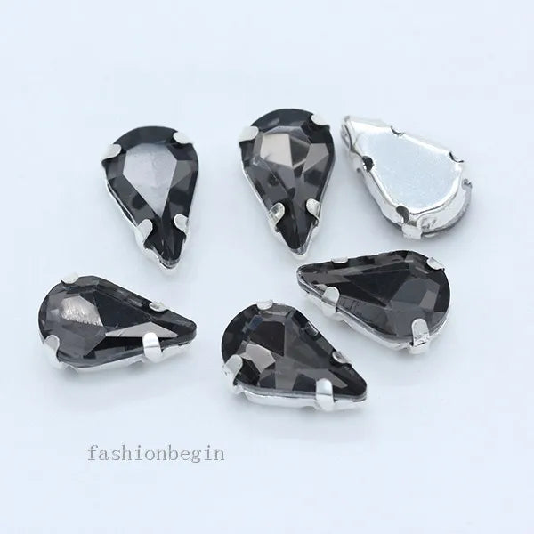 Droppformade strass stenar man syr fast