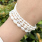 White oval shell beads in various sizes