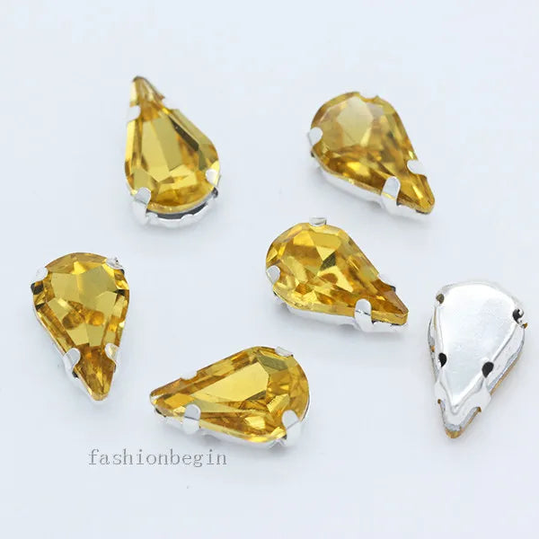 Droppformade strass stenar man syr fast