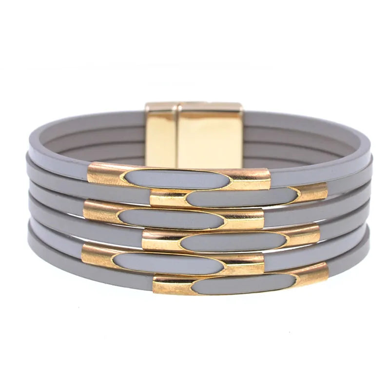 Läderarmband med guld metall och snaplock lås