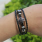 Armband flätad läder och metall sliders