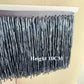 Tassel med tub pärlor på längd