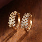 Earrings hoops with leaves in rhinestones