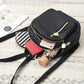 Small black backpack with multiple compartments 